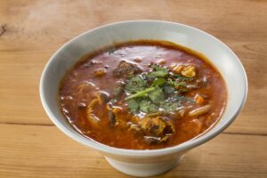 八王子で接待・会食などに使える焼肉店『焼肉カルロス』で提供するユッケジャンスープのイメージ画像